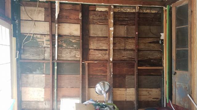 Really bad drywood termite damage and rot in a wall of my historic home